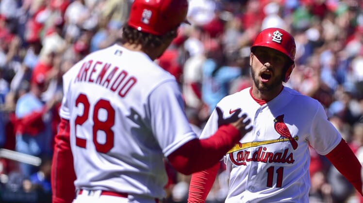 Apr 9, 2022; St. Louis, Missouri, USA;  St. Louis Cardinals shortstop Paul DeJong (11) celebrates with third baseman Nolan Arenado (28) after hitting a two run home run against the Pittsburgh Pirates during the third inning at Busch Stadium. Mandatory Credit: Jeff Curry-USA TODAY Sports