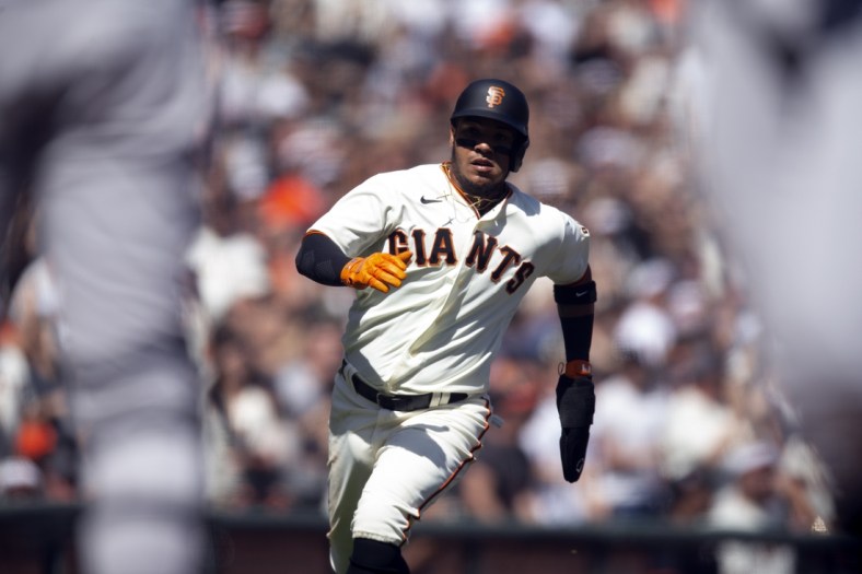 Apr 9, 2022; San Francisco, California, USA; San Francisco Giants second baseman Thairo Estrada (39) rounds third and heads for home on a double by Steven Duggar (6) during the fifth inning against the Miami Marlins at Oracle Park. Mandatory Credit: D. Ross Cameron-USA TODAY Sports