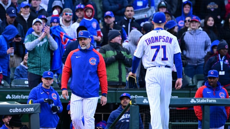 Apr 9, 2022; Chicago, Illinois, USA; Chicago Cubs manager David Ross enters the field as Chicago Cubs relief pitcher Keegan Thompson (71) was ejected from the game in the eight inning against the Milwaukee Brewers at Wrigley Field. Mandatory Credit: Quinn Harris-USA TODAY Sports