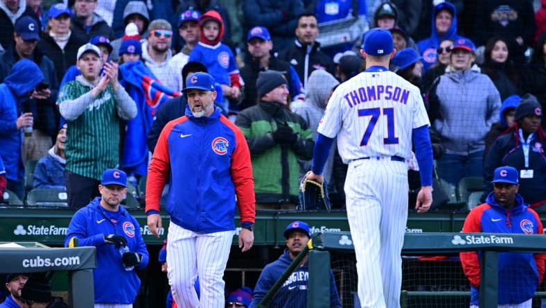 Apr 9, 2022; Chicago, Illinois, USA; Chicago Cubs manager David Ross enters the field as Chicago Cubs relief pitcher Keegan Thompson (71) was ejected from the game in the eight inning against the Milwaukee Brewers at Wrigley Field. Mandatory Credit: Quinn Harris-USA TODAY Sports