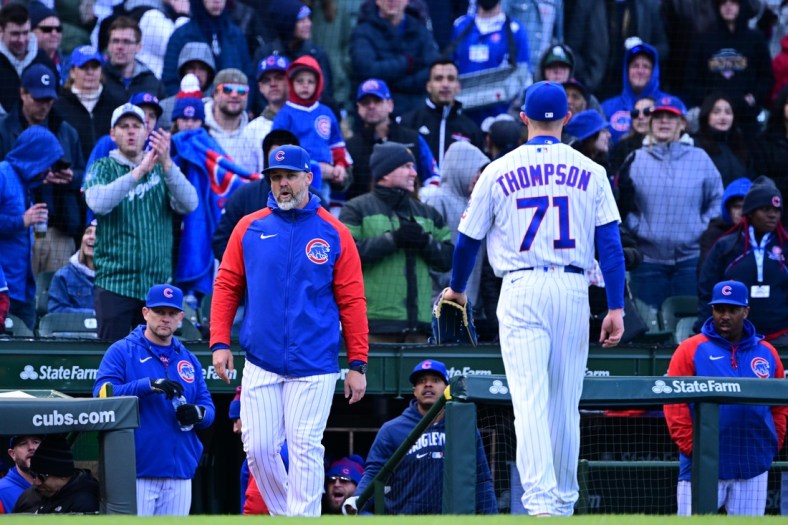 Apr 9, 2022; Chicago, Illinois, USA; Chicago Cubs manager David Ross enters the field as Chicago Cubs relief pitcher Keegan Thompson (71) was ejected from the game in the eight inning against the Milwaukee Brewers at Wrigley Field. Mandatory Credit: Quinn Harris-USA TODAY Sports