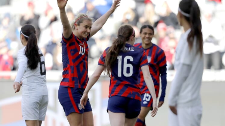Apr 9, 2022; Columbus, Ohio, USA; United States midfielder Lindsey Horan (10) celebrates a goal with United States midfielder Rose Lavelle (16) during the first half of the friendly soccer match against Uzbekistan at Lower.com Field. Mandatory Credit: Joseph Maiorana-USA TODAY Sports