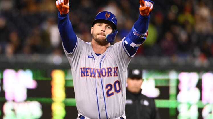 Apr 9, 2022; Washington, District of Columbia, USA; New York Mets first baseman Pete Alonso (20) gestures after hitting a grand slam against the Washington Nationals during the fifth inning at Nationals Park. Mandatory Credit: Brad Mills-USA TODAY Sports