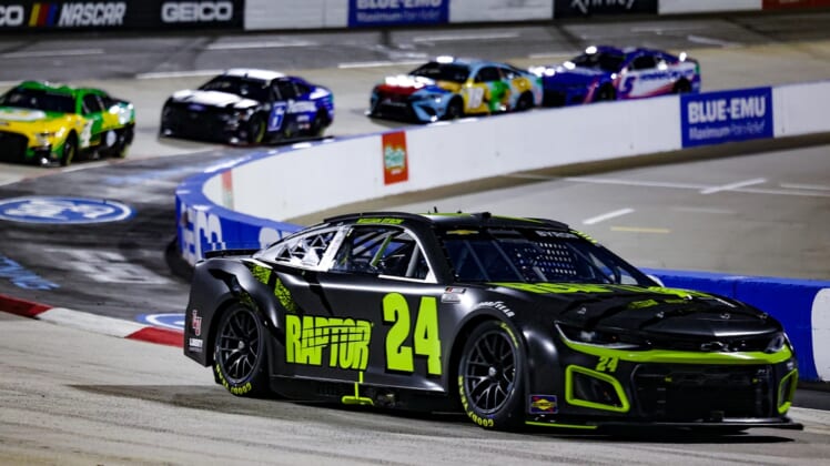 Apr 9, 2022; Martinsville, Virginia, USA; NASCAR Cup Series driver William Byron (24) races at the Blue-Emu Maximum Pain Relief 400 at Martinsville Speedway. Mandatory Credit: Ryan Hunt-USA TODAY Sports