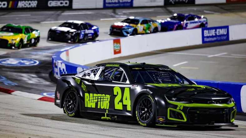 Apr 9, 2022; Martinsville, Virginia, USA; NASCAR Cup Series driver William Byron (24) races at the Blue-Emu Maximum Pain Relief 400 at Martinsville Speedway. Mandatory Credit: Ryan Hunt-USA TODAY Sports