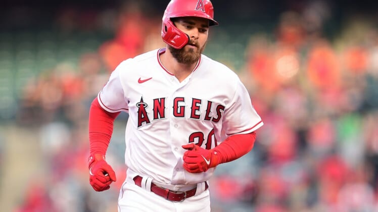 Apr 9, 2022; Anaheim, California, USA; Los Angeles Angels first baseman Jared Walsh (20) rounds the bases after hitting a solo home run against the Houston Astros during the second inning at Angel Stadium. Mandatory Credit: Gary A. Vasquez-USA TODAY Sports