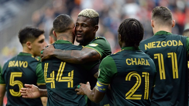 Apr 9, 2022; Vancouver, British Columbia, CAN;  Portland Timbers forward Dairon Asprilla (27) celebrates with teammates after scoring on a penalty kick against the Vancouver Whitecaps during the first half at BC Place. Mandatory Credit: Anne-Marie Sorvin-USA TODAY Sports