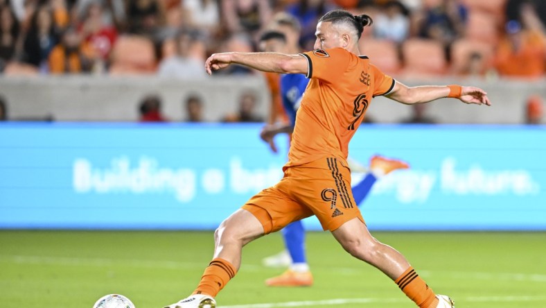 Apr 9, 2022; Houston, Texas, USA; Houston Dynamo forward Sebastian Ferreira (9) kicks the ball against San Jose Earthquakes at PNC Stadium. Mandatory Credit: Maria Lysaker-USA TODAY Sports