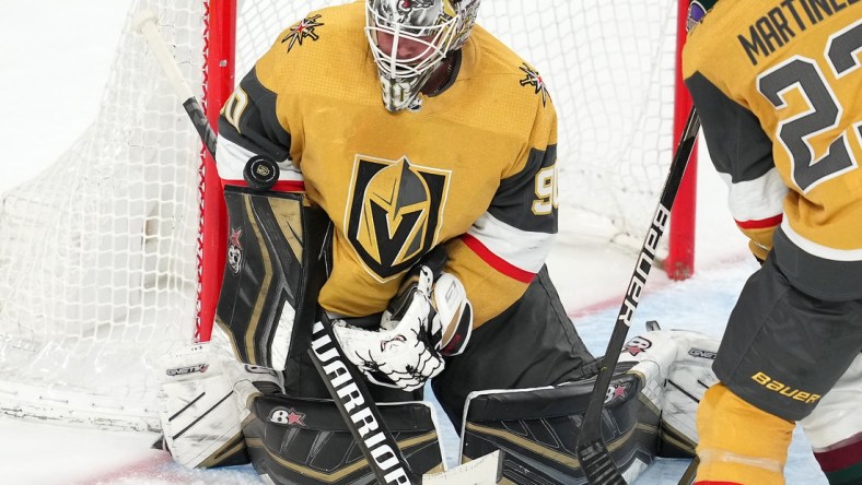 Apr 9, 2022; Las Vegas, Nevada, USA; Vegas Golden Knights goaltender Robin Lehner (90) makes a save against the Arizona Coyotes during the third period at T-Mobile Arena. Mandatory Credit: Stephen R. Sylvanie-USA TODAY Sports