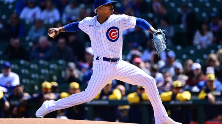 Apr 10, 2022; Chicago, Illinois, USA; Chicago Cubs starting pitcher Marcus Stroman (0) delivers the baseball in the first inning against the Milwaukee Brewers at Wrigley Field. Mandatory Credit: Quinn Harris-USA TODAY Sports