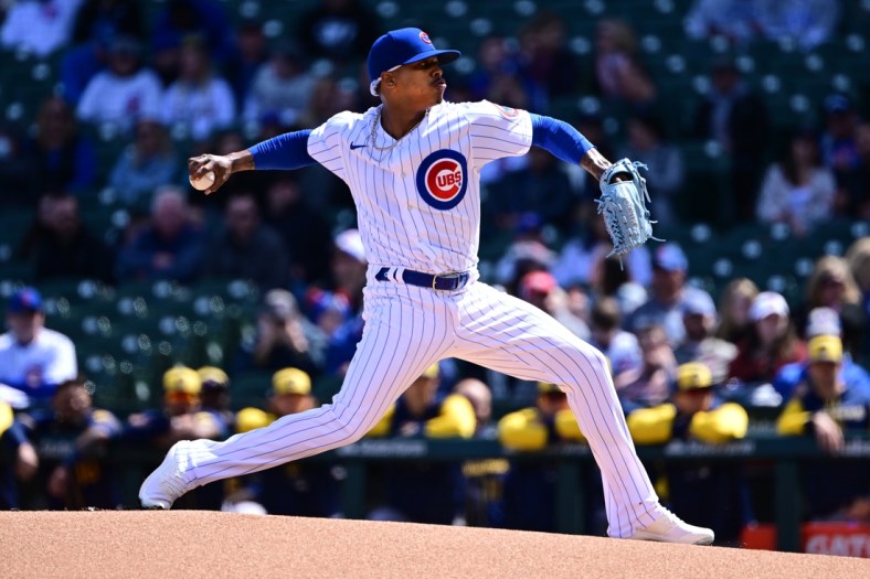 Apr 10, 2022; Chicago, Illinois, USA; Chicago Cubs starting pitcher Marcus Stroman (0) delivers the baseball in the first inning against the Milwaukee Brewers at Wrigley Field. Mandatory Credit: Quinn Harris-USA TODAY Sports