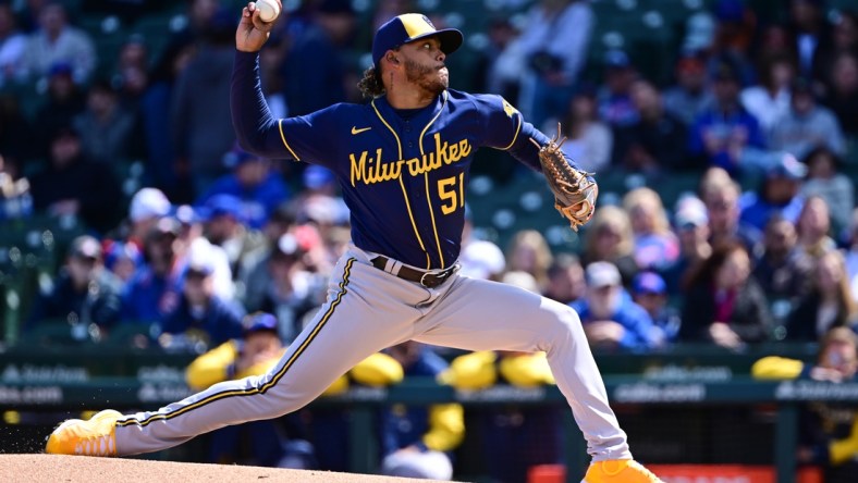 Apr 10, 2022; Chicago, Illinois, USA; Milwaukee Brewers starting pitcher Freddy Peralta (51) delivers the baseball in the first inning against the Chicago Cubs at Wrigley Field. Mandatory Credit: Quinn Harris-USA TODAY Sports