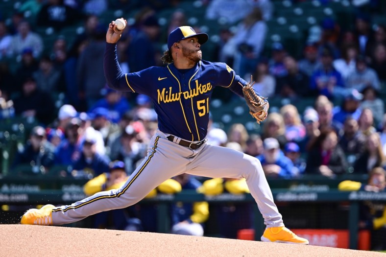 Apr 10, 2022; Chicago, Illinois, USA; Milwaukee Brewers starting pitcher Freddy Peralta (51) delivers the baseball in the first inning against the Chicago Cubs at Wrigley Field. Mandatory Credit: Quinn Harris-USA TODAY Sports