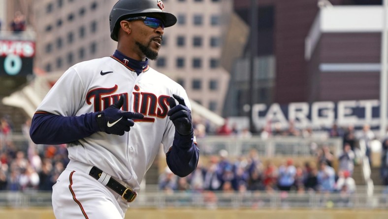 Apr 10, 2022; Minneapolis, Minnesota, USA; Minnesota Twins center fielder Byron Buxton (25) rounds the bases after hitting a solo home run off of Seattle Mariners starting pitcher Marco Gonzales (not pictured) during the first inning at Target Field. Mandatory Credit: Nick Wosika-USA TODAY Sports