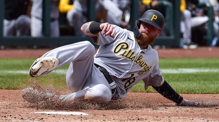 Apr 10, 2022; St. Louis, Missouri, USA;  Pittsburgh Pirates left fielder Ben Gamel (18) slides in at home after a wild pitch against the St. Louis Cardinals during the fourth inning at Busch Stadium. Mandatory Credit: Jeff Curry-USA TODAY Sports