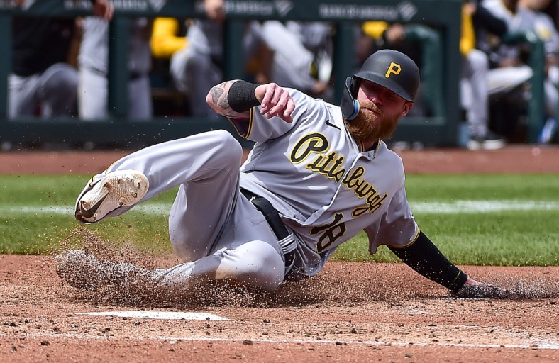 Apr 10, 2022; St. Louis, Missouri, USA;  Pittsburgh Pirates left fielder Ben Gamel (18) slides in at home after a wild pitch against the St. Louis Cardinals during the fourth inning at Busch Stadium. Mandatory Credit: Jeff Curry-USA TODAY Sports