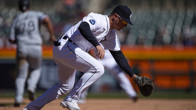 Apr 10, 2022; Detroit, Michigan, USA; Detroit Tigers first baseman Spencer Torkelson (20) chases the ball during the ninth inning against the Chicago White Sox at Comerica Park. Mandatory Credit: Raj Mehta-USA TODAY Sports
