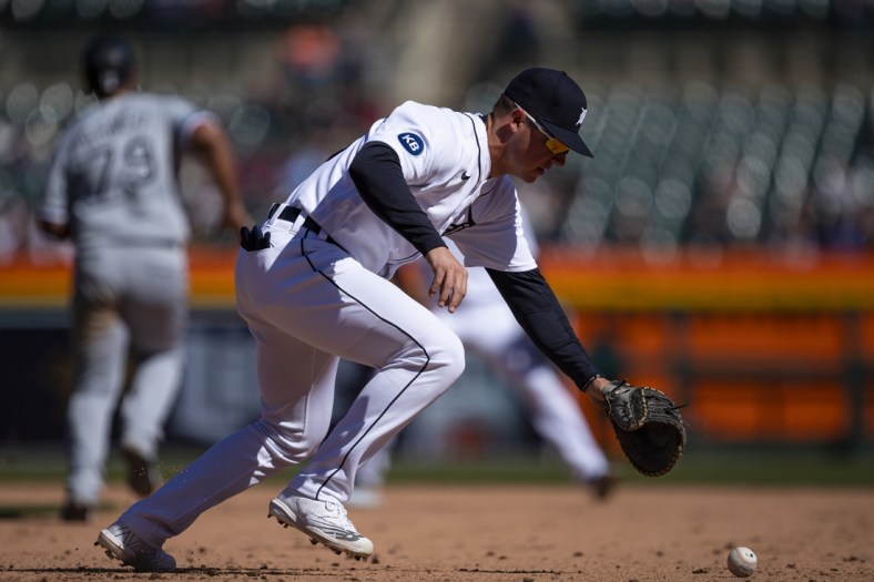Apr 10, 2022; Detroit, Michigan, USA; Detroit Tigers first baseman Spencer Torkelson (20) chases the ball during the ninth inning against the Chicago White Sox at Comerica Park. Mandatory Credit: Raj Mehta-USA TODAY Sports