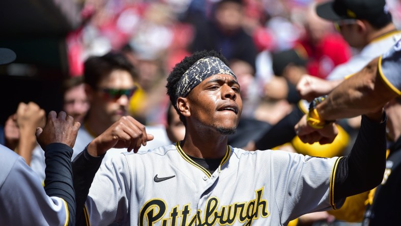 Apr 10, 2022; St. Louis, Missouri, USA;  Pittsburgh Pirates third baseman Ke'Bryan Hayes (13) high fives teammates before a game against the St. Louis Cardinals at Busch Stadium. Mandatory Credit: Jeff Curry-USA TODAY Sports