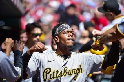 Apr 10, 2022; St. Louis, Missouri, USA;  Pittsburgh Pirates third baseman Ke'Bryan Hayes (13) high fives teammates before a game against the St. Louis Cardinals at Busch Stadium. Mandatory Credit: Jeff Curry-USA TODAY Sports