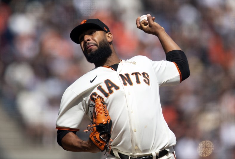 Apr 10, 2022; San Francisco, California, USA; San Francisco Giants pitcher Jarlin Garcia (66) delivers a pitch against the Miami Marlins during the sixth inning at Oracle Park. Mandatory Credit: D. Ross Cameron-USA TODAY Sports