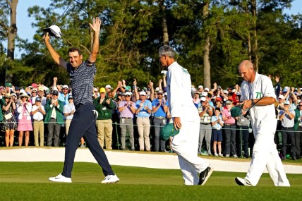 Apr 10, 2022; Augusta, Georgia, USA; Scott Scheffler celebrates after winning the Masters golf tournament. Mandatory Credit: Rob Schumacher-USA TODAY Sports