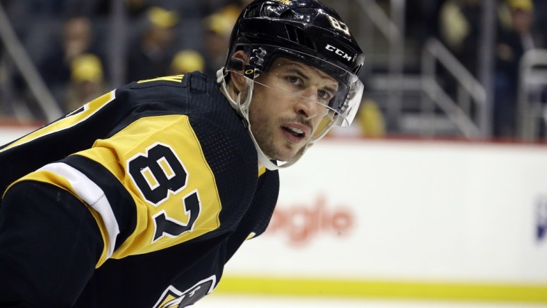 Apr 10, 2022; Pittsburgh, Pennsylvania, USA;  Pittsburgh Penguins center Sidney Crosby (87) looks on before a face-off against the Nashville Predators during the third period at PPG Paints Arena. The Penguins won 3-2 in overtime. Mandatory Credit: Charles LeClaire-USA TODAY Sports