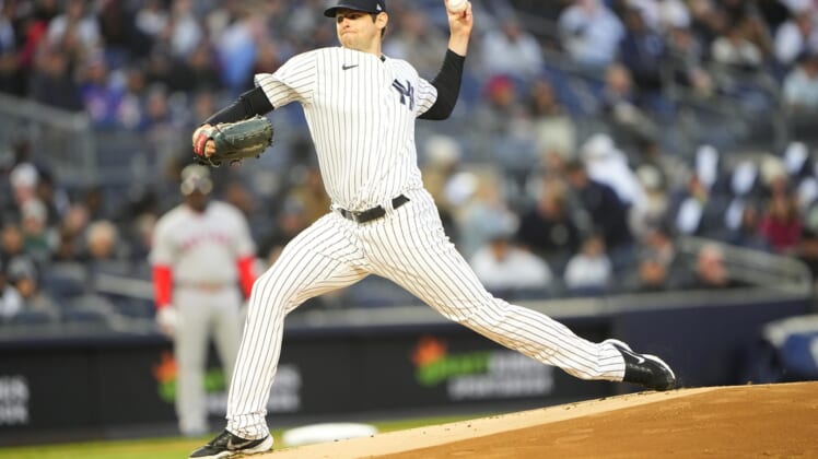 Apr 10, 2022; Bronx, New York, USA; New York Yankees pitcher Jordan Montgomery (47) delivers a pitch against the Boston Red Sox during the first inning at Yankee Stadium. Mandatory Credit: Gregory Fisher-USA TODAY Sports