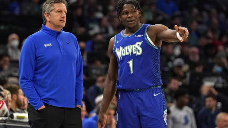Apr 10, 2022; Minneapolis, Minnesota, USA;  Minnesota Timberwolves head coach Chris Finch and guard Anthony Edwards (1) discus the previous play against the Chicago Bulls during the second quarter at Target Center. Mandatory Credit: Nick Wosika-USA TODAY Sports
