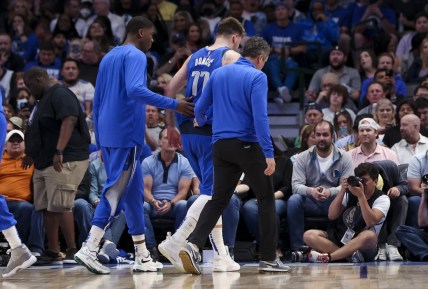 Apr 10, 2022; Dallas, Texas, USA; Dallas Mavericks guard Luka Doncic (77) walks off the court injured during the second half against the San Antonio Spurs at American Airlines Center. Mandatory Credit: Kevin Jairaj-USA TODAY Sports