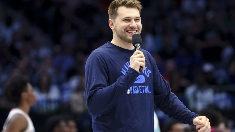 Apr 10, 2022; Dallas, Texas, USA;  Dallas Mavericks guard Luka Doncic (77) speaks to the crowd before the game against the San Antonio Spurs at American Airlines Center. Mandatory Credit: Kevin Jairaj-USA TODAY Sports