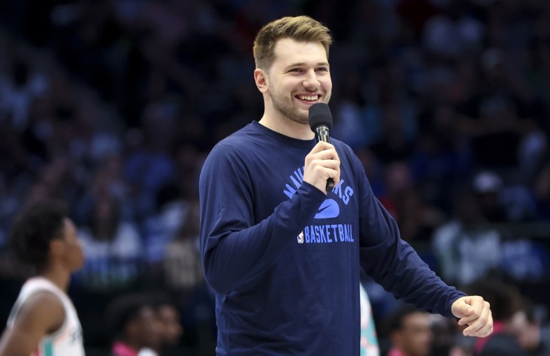 Apr 10, 2022; Dallas, Texas, USA;  Dallas Mavericks guard Luka Doncic (77) speaks to the crowd before the game against the San Antonio Spurs at American Airlines Center. Mandatory Credit: Kevin Jairaj-USA TODAY Sports