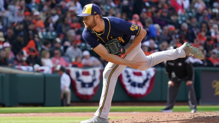 Apr 11, 2022; Baltimore, Maryland, USA; Milwaukee Brewers pitcher Adrian Houser (37) delivers a pitch in the third inning against the Baltimore Orioles at Oriole Park at Camden Yards. Mandatory Credit: Mitch Stringer-USA TODAY Sports
