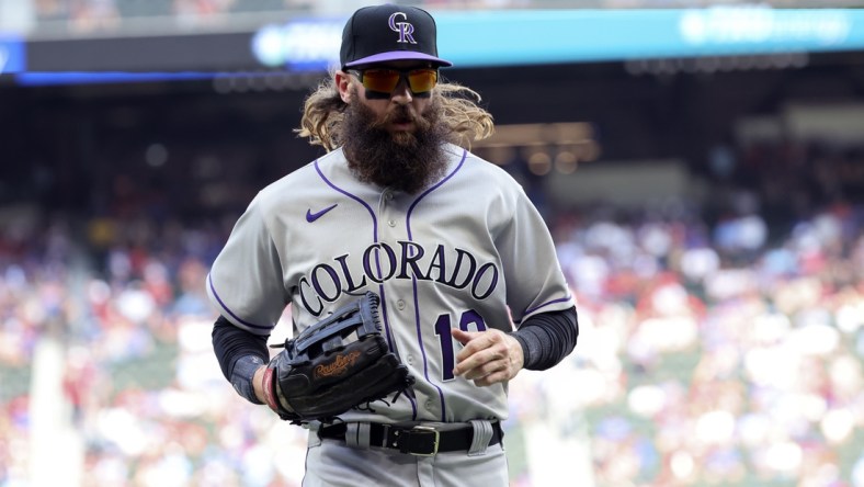 Apr 11, 2022; Arlington, Texas, USA;  Colorado Rockies right fielder Charlie Blackmon (19) leaves the field during the game against the Texas Rangers  at Globe Life Field. Mandatory Credit: Kevin Jairaj-USA TODAY Sports