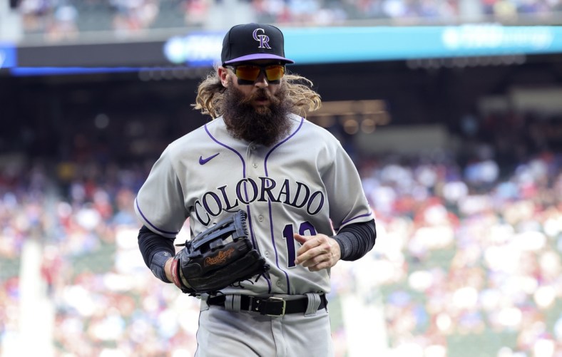 Apr 11, 2022; Arlington, Texas, USA;  Colorado Rockies right fielder Charlie Blackmon (19) leaves the field during the game against the Texas Rangers  at Globe Life Field. Mandatory Credit: Kevin Jairaj-USA TODAY Sports