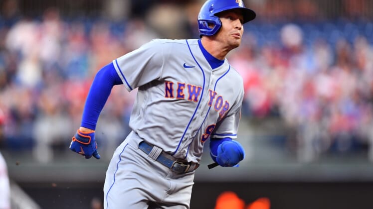 Apr 11, 2022; Philadelphia, Pennsylvania, USA; New York Mets outfielder Brandon Nimmo (9) runs toward third base in the first inning against the Philadelphia Phillies at Citizens Bank Park. Mandatory Credit: Kyle Ross-USA TODAY Sports