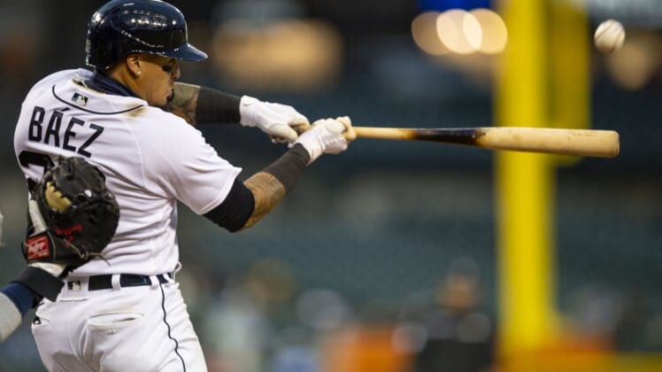 Apr 11, 2022; Detroit, Michigan, USA; Detroit Tigers shortstop Javier Baez (28) hits a two run home run during the eighth inning against the Boston Red Sox at Comerica Park. Mandatory Credit: Raj Mehta-USA TODAY Sports