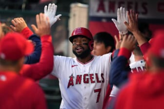Apr 11, 2022; Anaheim, California, USA; Los Angeles Angels left fielder Jo Adell (7) is congratulated in the dugout after hitting a home run during the second inning against the Miami Marlins at Angel Stadium. Mandatory Credit: Kirby Lee-USA TODAY Sports