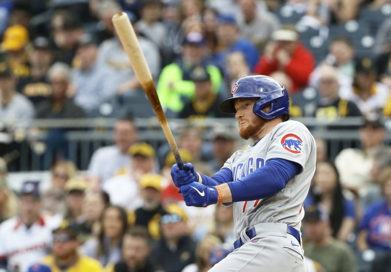 Apr 12, 2022; Pittsburgh, Pennsylvania, USA;  Chicago Cubs designated hitter Clint Frazier (77) hits a double against the Pittsburgh Pirates during the sixth inning at PNC Park. Mandatory Credit: Charles LeClaire-USA TODAY Sports