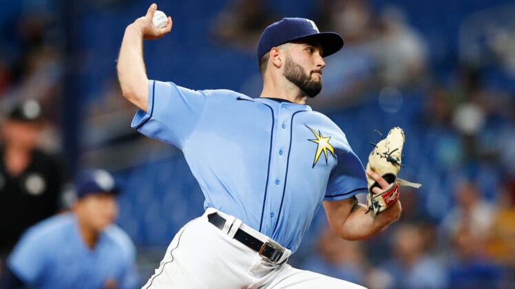 Apr 12, 2022; St. Petersburg, Florida, USA;  Tampa Bay Rays starting pitcher Tommy Romero (52) throws a pitch against the Oakland Athletics in the first inning at Tropicana Field. Mandatory Credit: Nathan Ray Seebeck-USA TODAY Sports