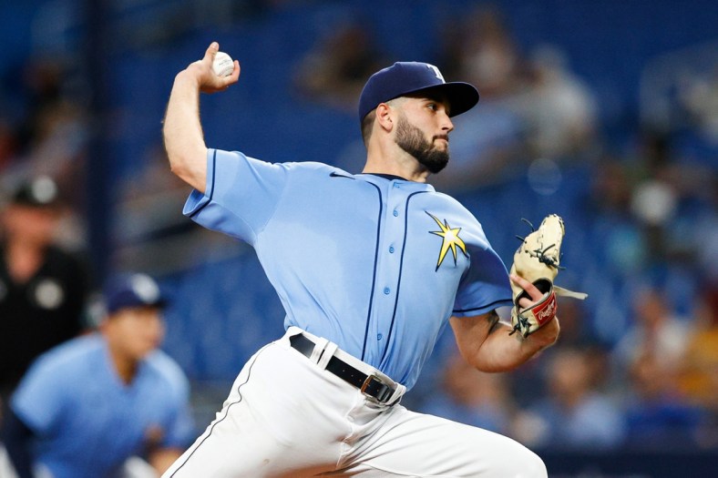 Apr 12, 2022; St. Petersburg, Florida, USA;  Tampa Bay Rays starting pitcher Tommy Romero (52) throws a pitch against the Oakland Athletics in the first inning at Tropicana Field. Mandatory Credit: Nathan Ray Seebeck-USA TODAY Sports