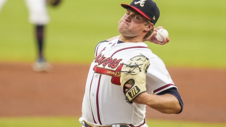 Apr 12, 2022; Cumberland, Georgia, USA; Atlanta Braves starting pitcher Bryce Elder (55) pitches against the Washington Nationals during the first inning at Truist Park. Mandatory Credit: Dale Zanine-USA TODAY Sports