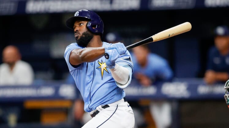 Apr 12, 2022; St. Petersburg, Florida, USA;  Tampa Bay Rays right fielder Randy Arozarena (56) hits a double against the Oakland Athletics in the first inning at Tropicana Field. Mandatory Credit: Nathan Ray Seebeck-USA TODAY Sports