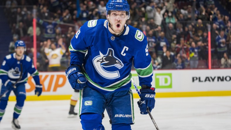 Apr 12, 2022; Vancouver, British Columbia, CAN; Vancouver Canucks forward Bo Horvat (53) celebrates his goal against the Vegas Golden Knights in the first period at Rogers Arena. Mandatory Credit: Bob Frid-USA TODAY Sports