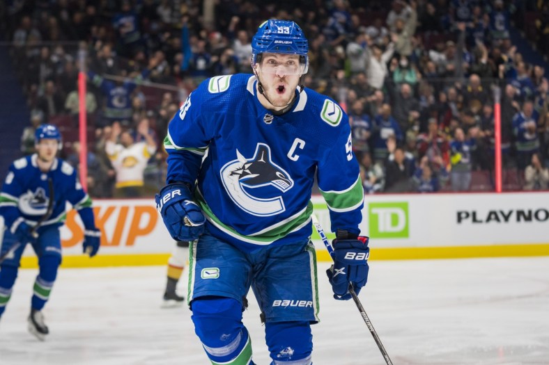 Apr 12, 2022; Vancouver, British Columbia, CAN; Vancouver Canucks forward Bo Horvat (53) celebrates his goal against the Vegas Golden Knights in the first period at Rogers Arena. Mandatory Credit: Bob Frid-USA TODAY Sports