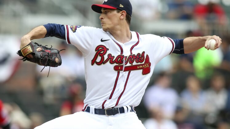 Apr 13, 2022; Atlanta, Georgia, USA; Atlanta Braves starting pitcher Max Fried (54) throws against the Washington Nationals in the first inning at Truist Park. Mandatory Credit: Brett Davis-USA TODAY Sports