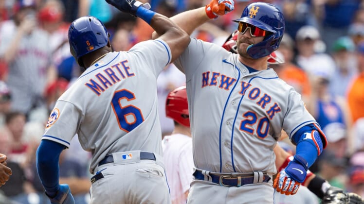 Apr 13, 2022; Philadelphia, Pennsylvania, USA; New York Mets first baseman Pete Alonso (20) celebrates with center fielder Starling Marte (6) after hitting a three RBI home run during the sixth inning against the Philadelphia Phillies during the fifth inning at Citizens Bank Park. Mandatory Credit: Bill Streicher-USA TODAY Sports