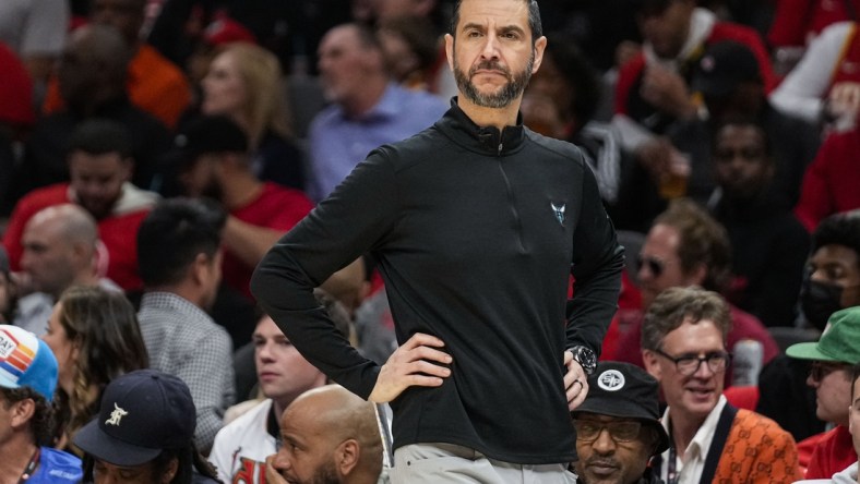 Apr 13, 2022; Atlanta, Georgia, USA; Charlotte Hornets head coach James Borrego on the bench during the game against the Atlanta Hawks during the first half at State Farm Arena. Mandatory Credit: Dale Zanine-USA TODAY Sports