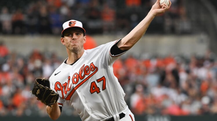 Apr 13, 2022; Baltimore, Maryland, USA;  Baltimore Orioles starting pitcher John Means (47) delivers a first inning pitch against the Milwaukee Brewers at Oriole Park at Camden Yards. Mandatory Credit: Tommy Gilligan-USA TODAY Sports