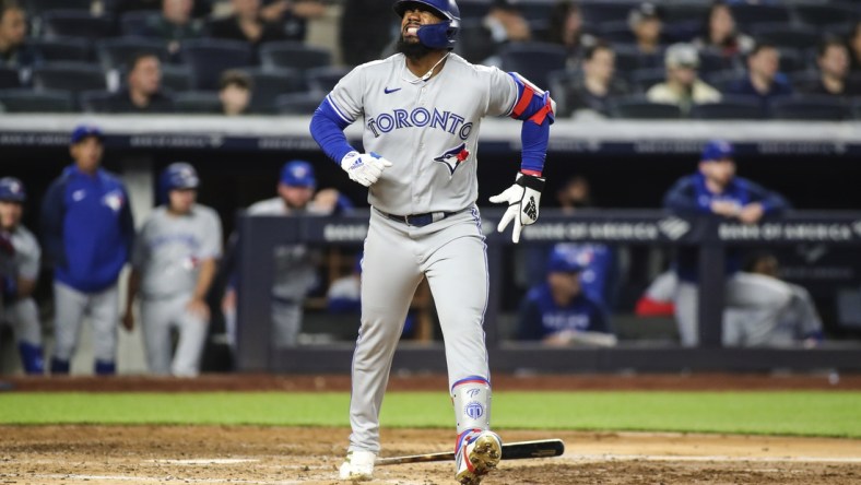 Apr 13, 2022; Bronx, New York, USA;  Toronto Blue Jays right fielder Teoscar Hernandez (37) reacts after injuring himself on a swing in the sixth inning against the New York Yankees at Yankee Stadium. Mandatory Credit: Wendell Cruz-USA TODAY Sports